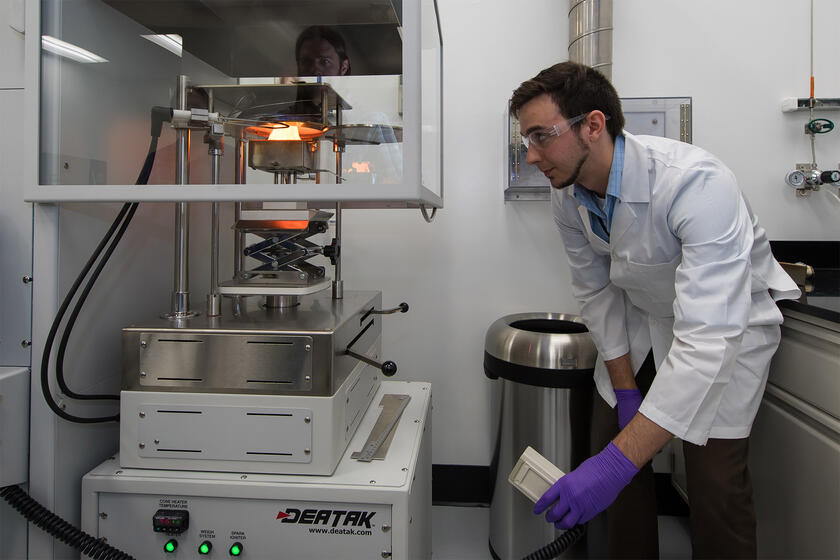 Associate in the lab testing fabrics